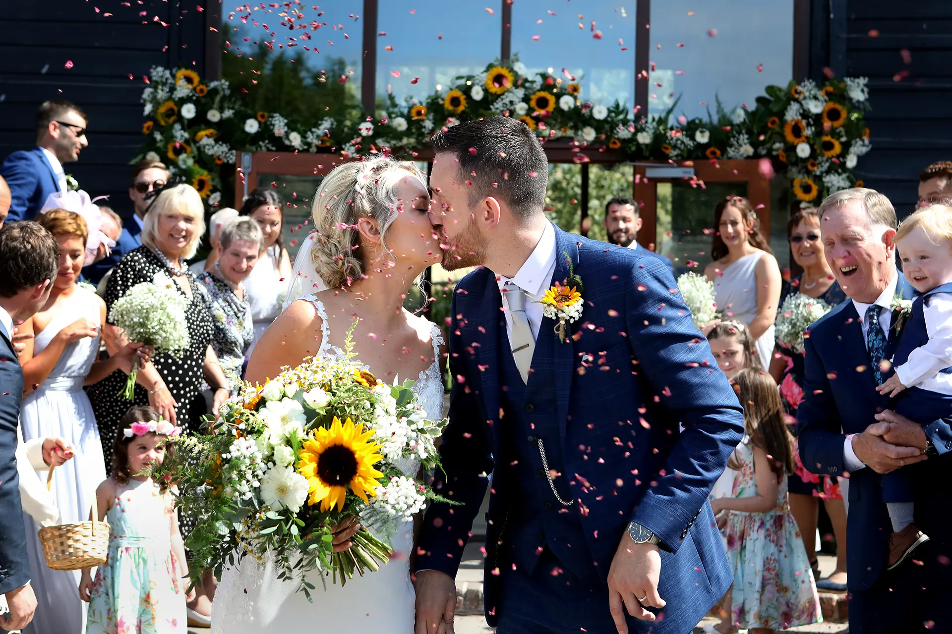 upwaltham barns wedding gallery courtyard confetti kiss