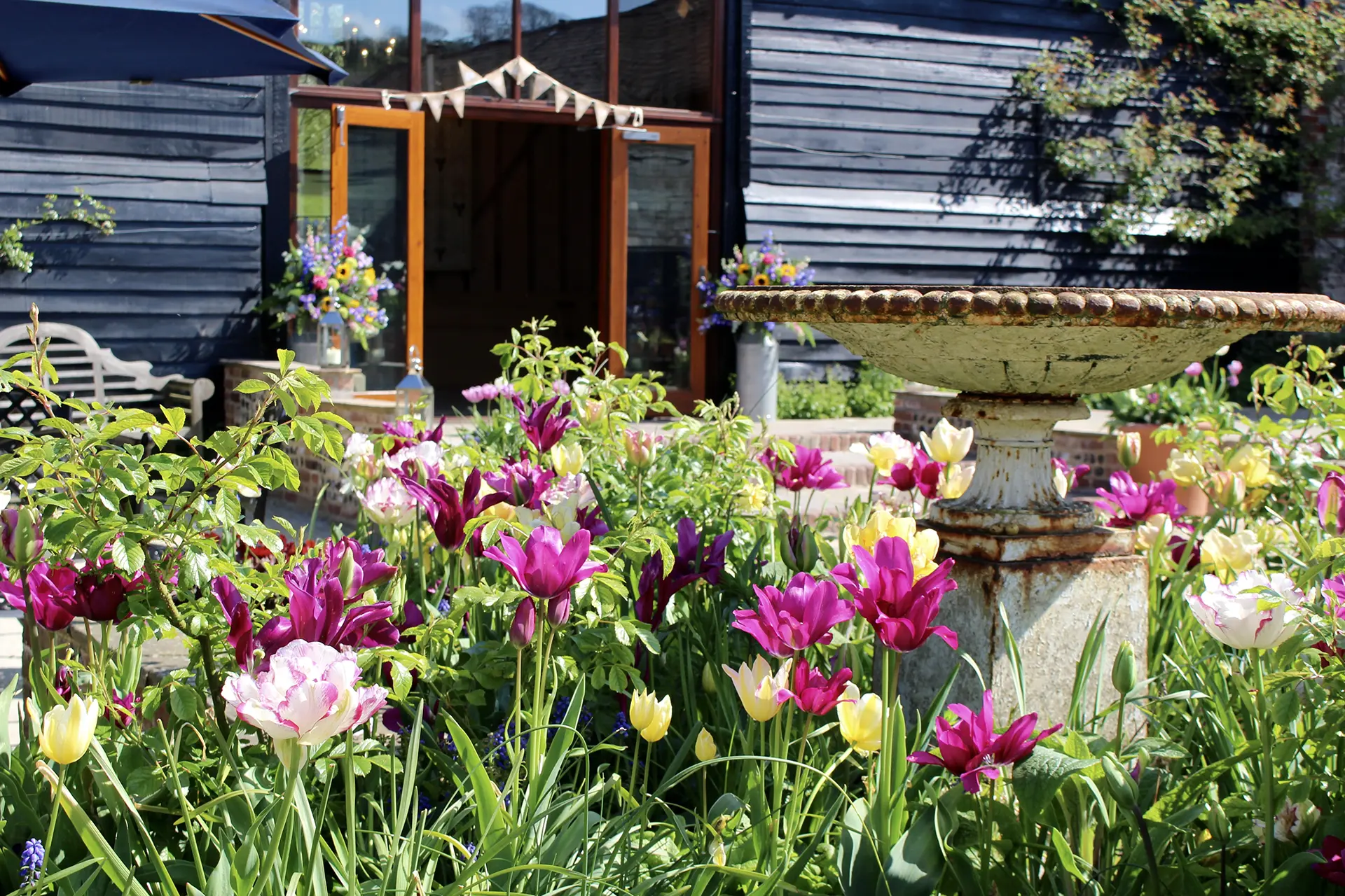 upwaltham barns wedding gallery courtyard tulips