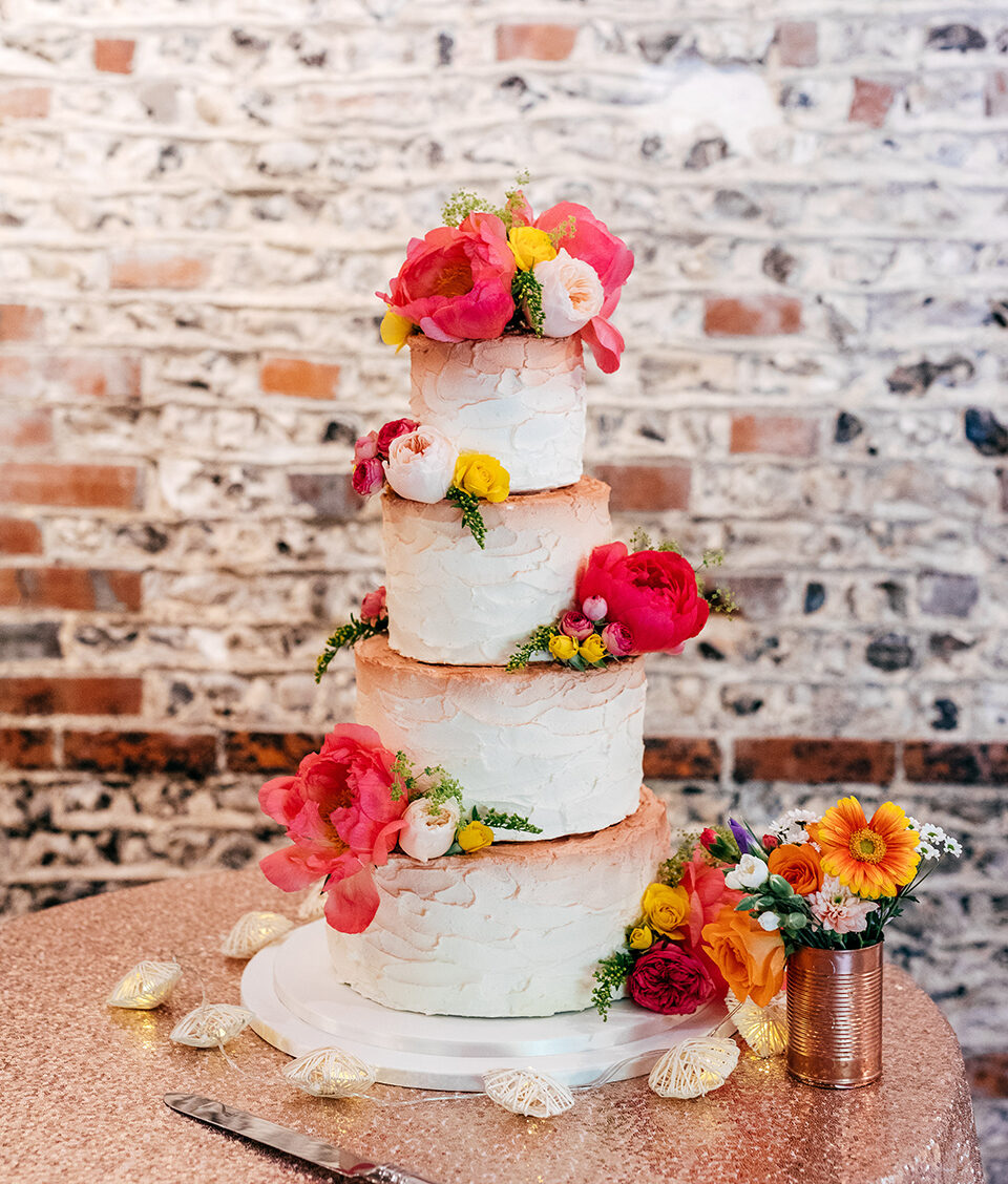wedding cake bright florals upwaltham barns