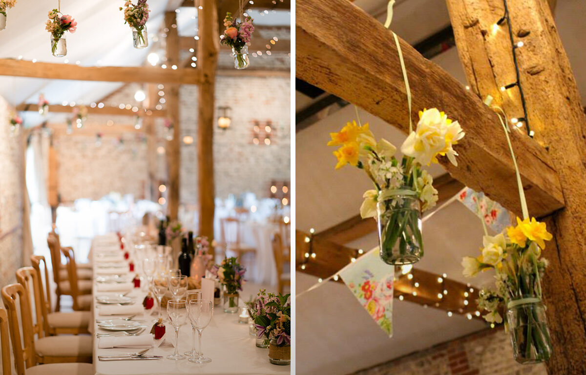 1.Spring wedding flowers hanging jam jars Chris Giles Photography