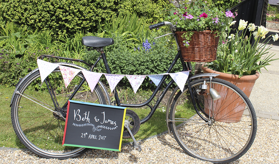 12.bicycle wedding sign bunting upwaltham barns