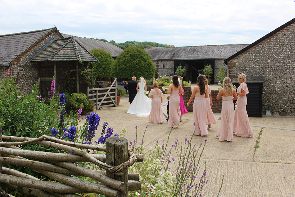bride and bridesmaids Upwaltham Barns blog post