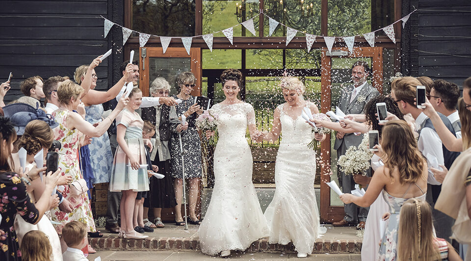 5.brides enjoy confetti moment bunting upwaltham barns