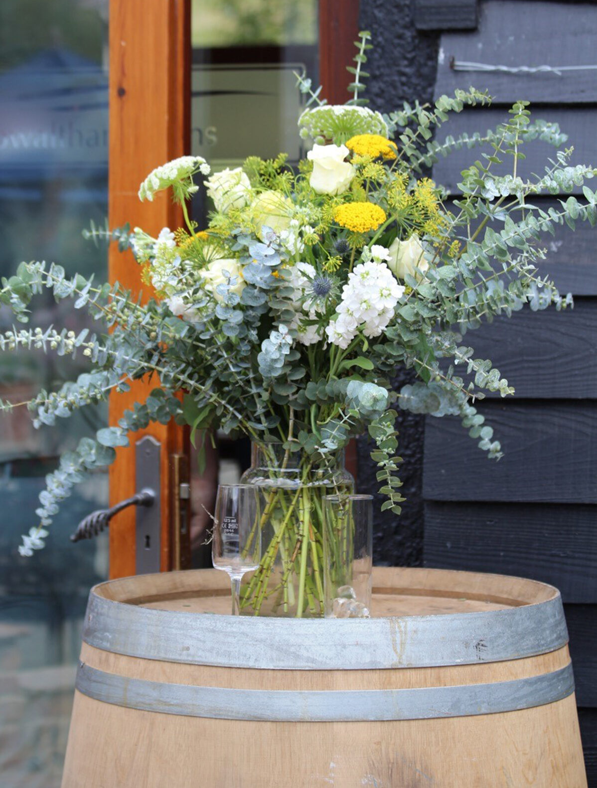 7.spring barn wedding ideas wooden barrels