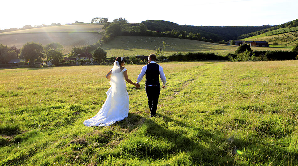 bride and groom sussex countryside jess jon upwaltham barns