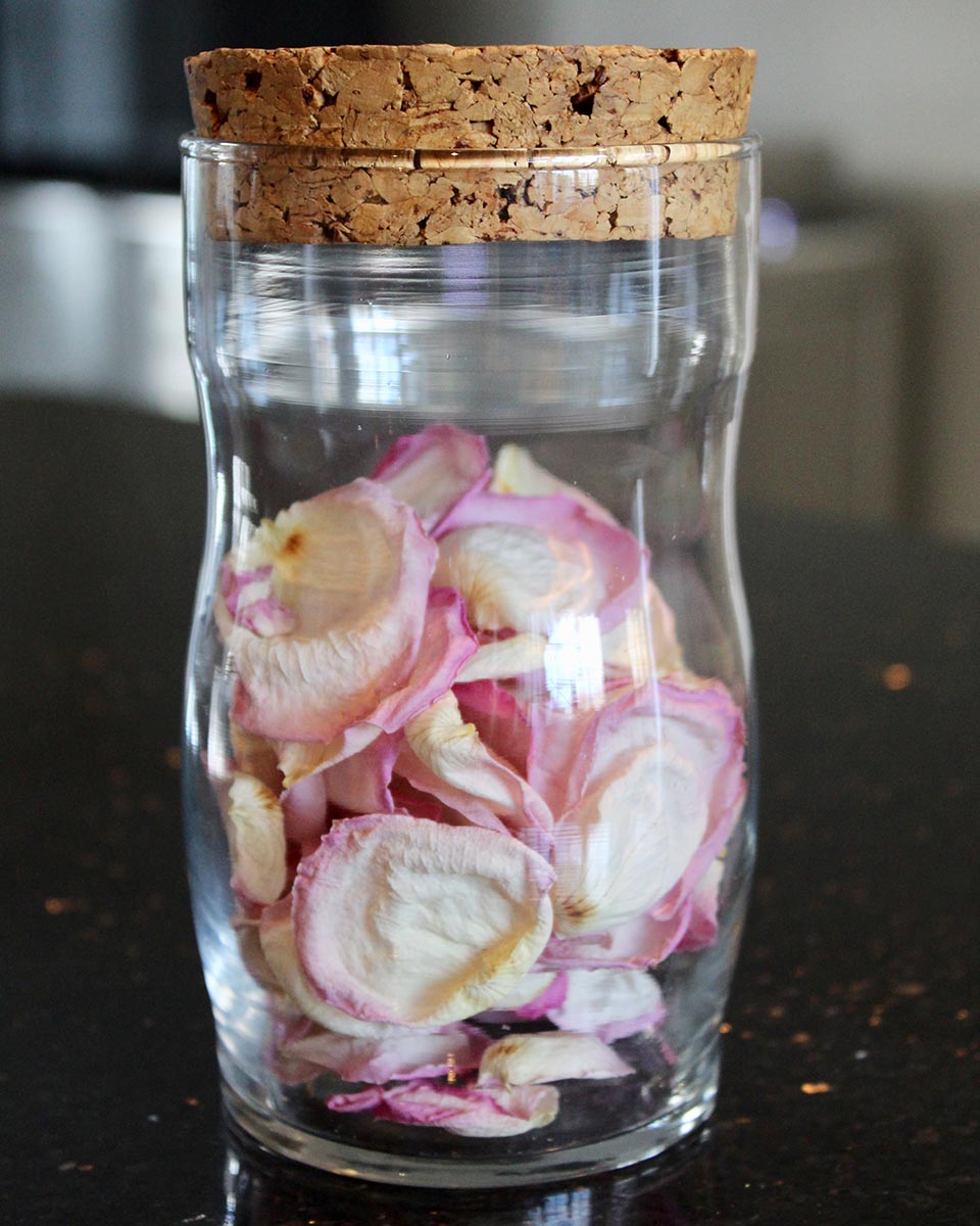 petals in glass jar homemade petal confetti upwaltham barns wedding venues west sussex