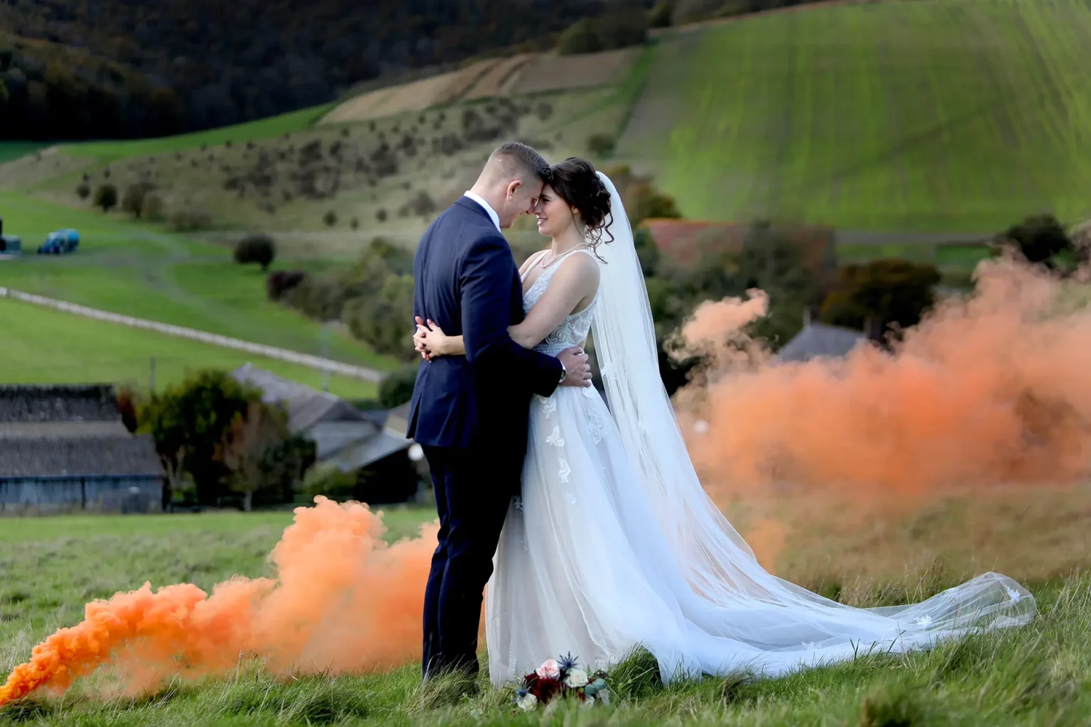 upwaltham barns wedding gallery autumn couple smoke bomb