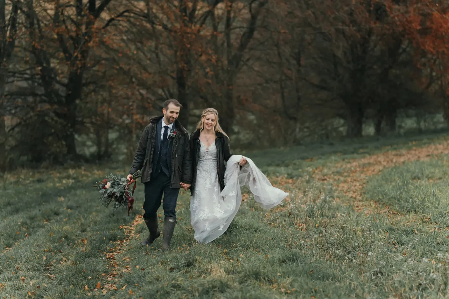 upwaltham barns wedding gallery autumn couple walk wellies