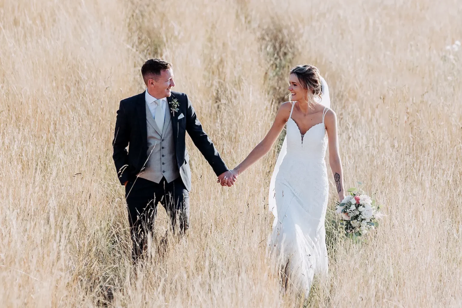 upwaltham barns wedding gallery couple corn field