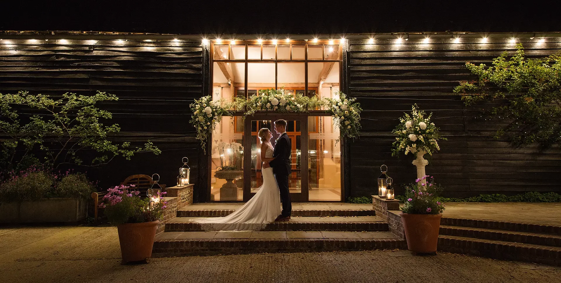 upwaltham barns wedding gallery courtyard east barn evening