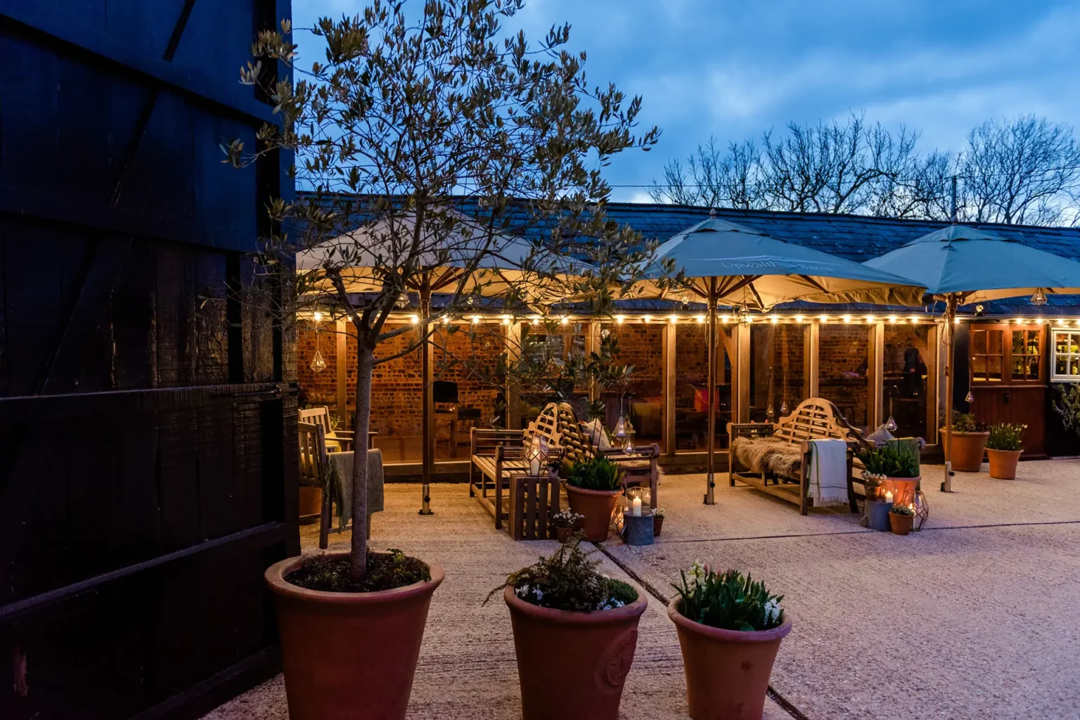 upwaltham barns wedding stable bar evening