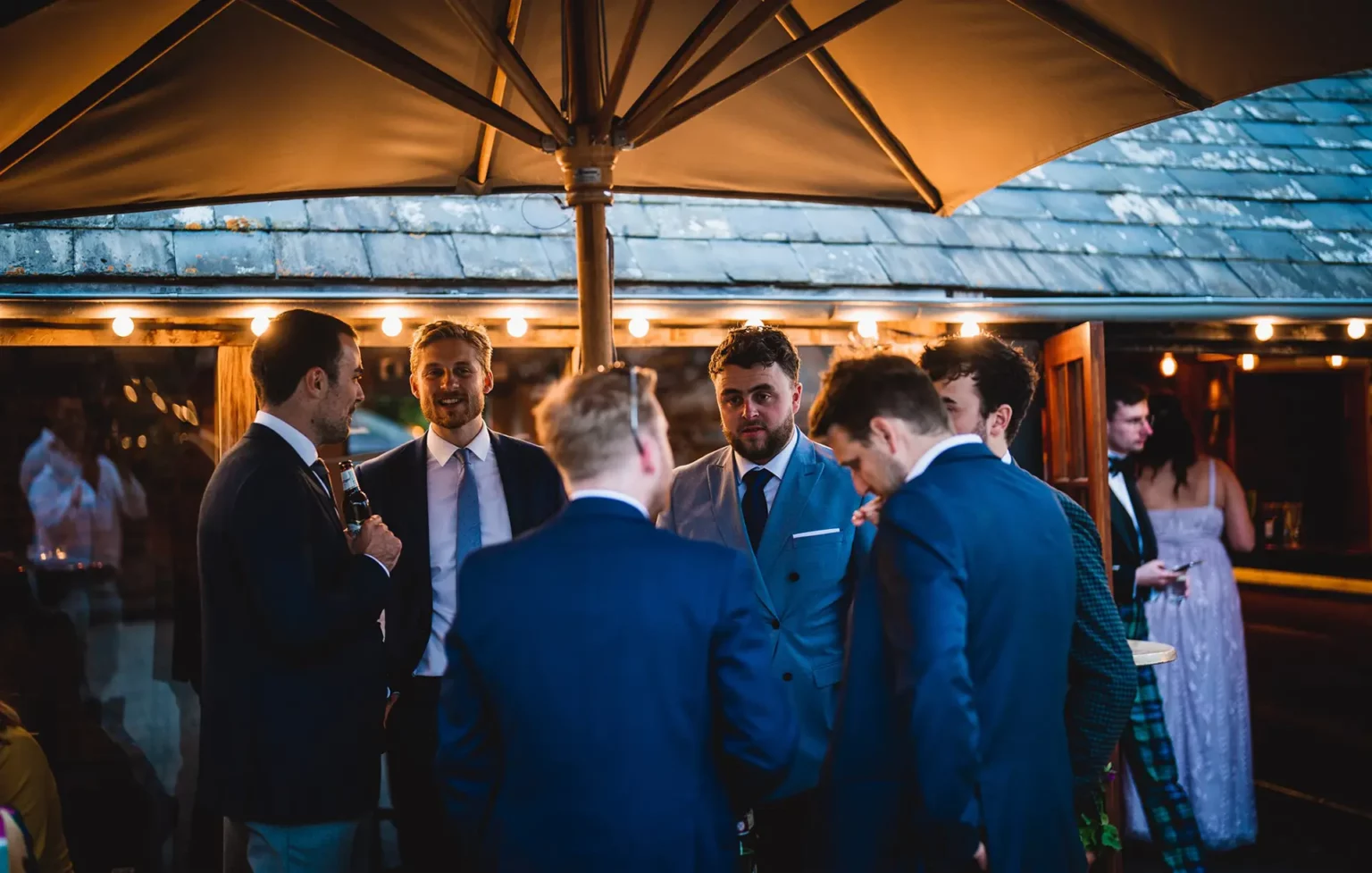 upwaltham barns wedding stable bar guests evening