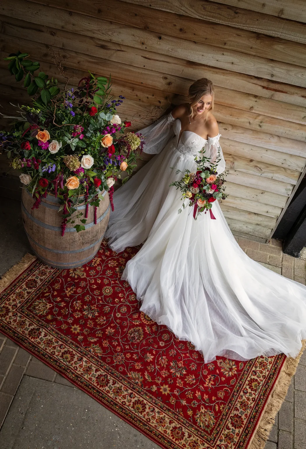 Upwaltham Barns bride with wedding flowers