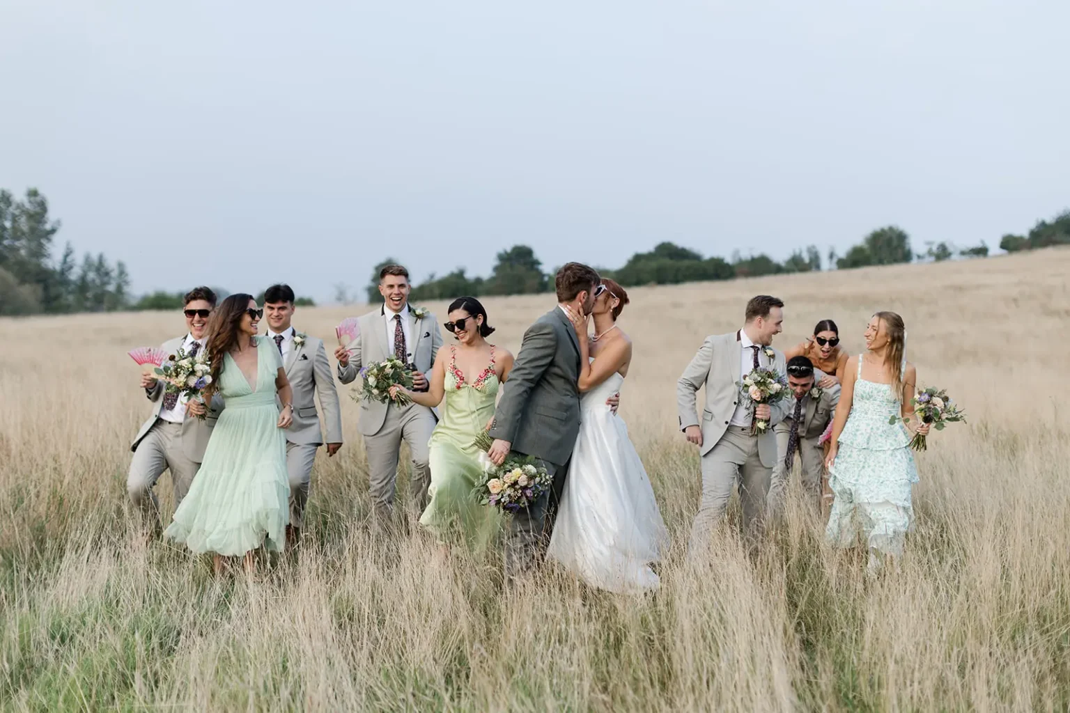 Upwaltham Barns wedding party in field