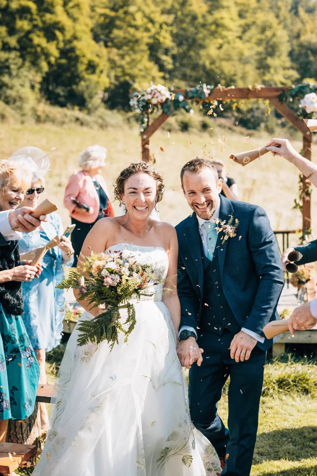 Upwaltham Barns wild weddings couple confetti shot